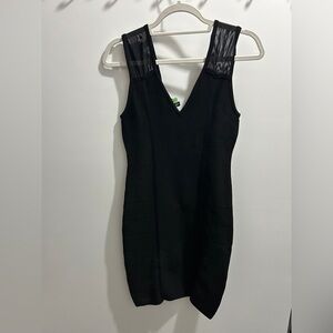 Bebe black V neck tight mini dress size M